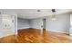 Open living space with hardwood floors and modern light fixtures at 206 Hillcrest Dr, Safety Harbor, FL 34695
