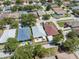 A vibrant neighborhood showing well-kept homes and green spaces with mature landscaping at 2108 Delightful Dr, Ruskin, FL 33570
