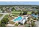 Community amenities with a swimming pool, playground, and well-manicured green areas at 2108 Delightful Dr, Ruskin, FL 33570