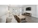 Spacious living room with modern furniture, wood floors and natural light at 2108 Delightful Dr, Ruskin, FL 33570