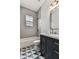 Modern bathroom features stylish tile, a bathtub, and a vanity with sleek fixtures and hardware at 238 7Th S Ave, Safety Harbor, FL 34695