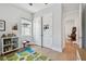 bedroom with a colorful carpet, window, fan, and closet with basketball hoop at 238 7Th S Ave, Safety Harbor, FL 34695