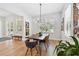 Elegant dining room features a modern chandelier and plenty of natural light at 238 7Th S Ave, Safety Harbor, FL 34695
