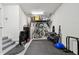 Well-organized garage with storage solutions and gym equipment, offering functionality and space at 238 7Th S Ave, Safety Harbor, FL 34695