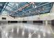 Spacious gymnasium features basketball hoops and a polished court at 238 7Th S Ave, Safety Harbor, FL 34695