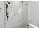 Modern bathroom showcasing a glass enclosed shower with a rainfall shower head and stylish herringbone tile at 238 7Th S Ave, Safety Harbor, FL 34695