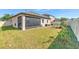 Spacious backyard with enclosed patio at 25200 Lambrusco Loop, Lutz, FL 33559