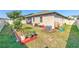 Spacious backyard featuring a white privacy fence at 25200 Lambrusco Loop, Lutz, FL 33559