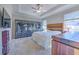 Bedroom with tray ceiling, bright natural lighting, and unique design and decor at 25200 Lambrusco Loop, Lutz, FL 33559
