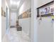 Entry hallway featuring tile floors and decor at 25200 Lambrusco Loop, Lutz, FL 33559