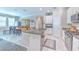 Gourmet kitchen with granite countertops and stainless steel appliances at 25200 Lambrusco Loop, Lutz, FL 33559