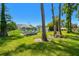 Beautiful backyard with fire pit, perfect for enjoying the outdoors at 2648 Lake Manor Dr, Land O Lakes, FL 34639