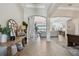 Spacious foyer with high ceilings, open floor plan, and a view to the lake at 2648 Lake Manor Dr, Land O Lakes, FL 34639