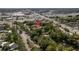 Aerial view of the community showcasing mature trees, landscaping, and central location at 2650 Countryside Blvd # C204, Clearwater, FL 33761