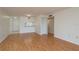 Open-concept living room with bar and dining room view at 2650 Countryside Blvd # C204, Clearwater, FL 33761