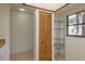 Bright pantry area with a storage closet and wire shelving near a window at 2650 Countryside Blvd # C204, Clearwater, FL 33761