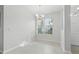 Bright dining area with neutral walls and modern lighting fixture at 27563 Pleasure Ride Loop, Wesley Chapel, FL 33544