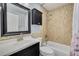 Stylish bathroom featuring a tiled shower, modern vanity, and neutral color scheme at 2770 Steeple Ct, Palm Harbor, FL 34684