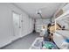 The spacious garage is well-lit and can be used for parking and extra storage at 2770 Steeple Ct, Palm Harbor, FL 34684
