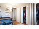Bedroom features hardwood floors, a built in closet, and a view to an adjacent room at 2941 Lichen Ln # B, Clearwater, FL 33760