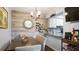 Dining room adjacent to kitchen with wood accent wall and wine rack at 2941 Lichen Ln # B, Clearwater, FL 33760