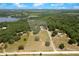 Aerial view of the expansive property showcasing the home's generous acreage and privacy at 31949 Amberlea Rd, Dade City, FL 33523
