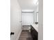 Bathroom with modern vanity, shower with glass, and neutral color palette at 31949 Amberlea Rd, Dade City, FL 33523