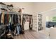 A huge walk-in closet and changing room, offering maximum storage and plenty of space at 31949 Amberlea Rd, Dade City, FL 33523