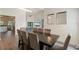 Spacious dining room area adjacent to living room and kitchen with a dining room table at 31949 Amberlea Rd, Dade City, FL 33523