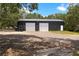 Metal two car garage with two doors at 31949 Amberlea Rd, Dade City, FL 33523