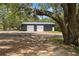 Metal two car garage with two doors at 31949 Amberlea Rd, Dade City, FL 33523
