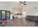 Open living space featuring a modern kitchen and access to an outdoor patio area at 31949 Amberlea Rd, Dade City, FL 33523