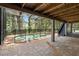 Inviting screened-in pool, perfect for outdoor leisure and recreation, surrounded by a serene backyard setting at 31949 Amberlea Rd, Dade City, FL 33523