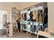 Custom walk-in closet features ample shelving, hanging rods, and storage, maximizing organization and space at 31949 Amberlea Rd, Dade City, FL 33523