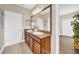 Spacious bathroom with double sinks and granite counters at 32624 Summerglade Dr, Wesley Chapel, FL 33545