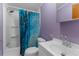 Colorful bathroom with shower/tub combination and modern sink at 3373 Olson Rd, Spring Hill, FL 34607