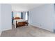 Primary bedroom with en suite bathroom and carpeting throughout the room at 3373 Olson Rd, Spring Hill, FL 34607