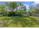 Charming single-Gathering home with a well-maintained lawn and mature trees at 3373 Olson Rd, Spring Hill, FL 34607