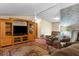 Inviting living room with neutral tones, plush seating, and natural light at 3373 Olson Rd, Spring Hill, FL 34607