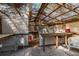 Shed interior with workbench, storage shelves, and translucent roof at 3373 Olson Rd, Spring Hill, FL 34607