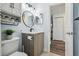 Stylish bathroom with modern vanity, updated fixtures, and fresh paint at 3628 Dellefield St, New Port Richey, FL 34655