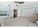 Bedroom featuring a comfortable bed, dresser, and a ceiling fan at 3628 Dellefield St, New Port Richey, FL 34655