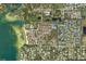 Aerial view of a residential community with private beach access and lush surroundings at 3640 41St S Ln # F, St Petersburg, FL 33711