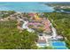 Aerial view showcasing the community's pool, tennis courts and lush landscaping at 3640 41St S Ln # F, St Petersburg, FL 33711
