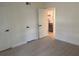 Well-lit bedroom space showing the closet and open access to the modern kitchen at 3640 41St S Ln # F, St Petersburg, FL 33711