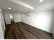 Bright living room with hardwood floors, recessed lights, and split unit air conditioning at 3980 55Th N Ave, St Petersburg, FL 33714