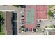 Overhead view of complex showing parking near tennis and basketball courts at 4030 Cortez Dr # C, Tampa, FL 33614