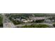 A birds eye view showcasing a condominium community and its proximity to a highway and local businesses at 4030 Cortez Dr # C, Tampa, FL 33614