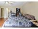 Comfortable bedroom featuring a ceiling fan and an ensuite bathroom at 4030 Cortez Dr # C, Tampa, FL 33614