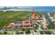 Aerial view showcasing community, the lake with fountain and convenient parking at 4306 Bayside Village Dr # 201, Tampa, FL 33615